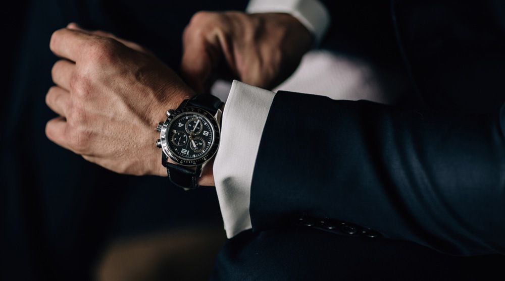 Man wearing a luxury watch on his wrist, an ideal Christmas gift idea